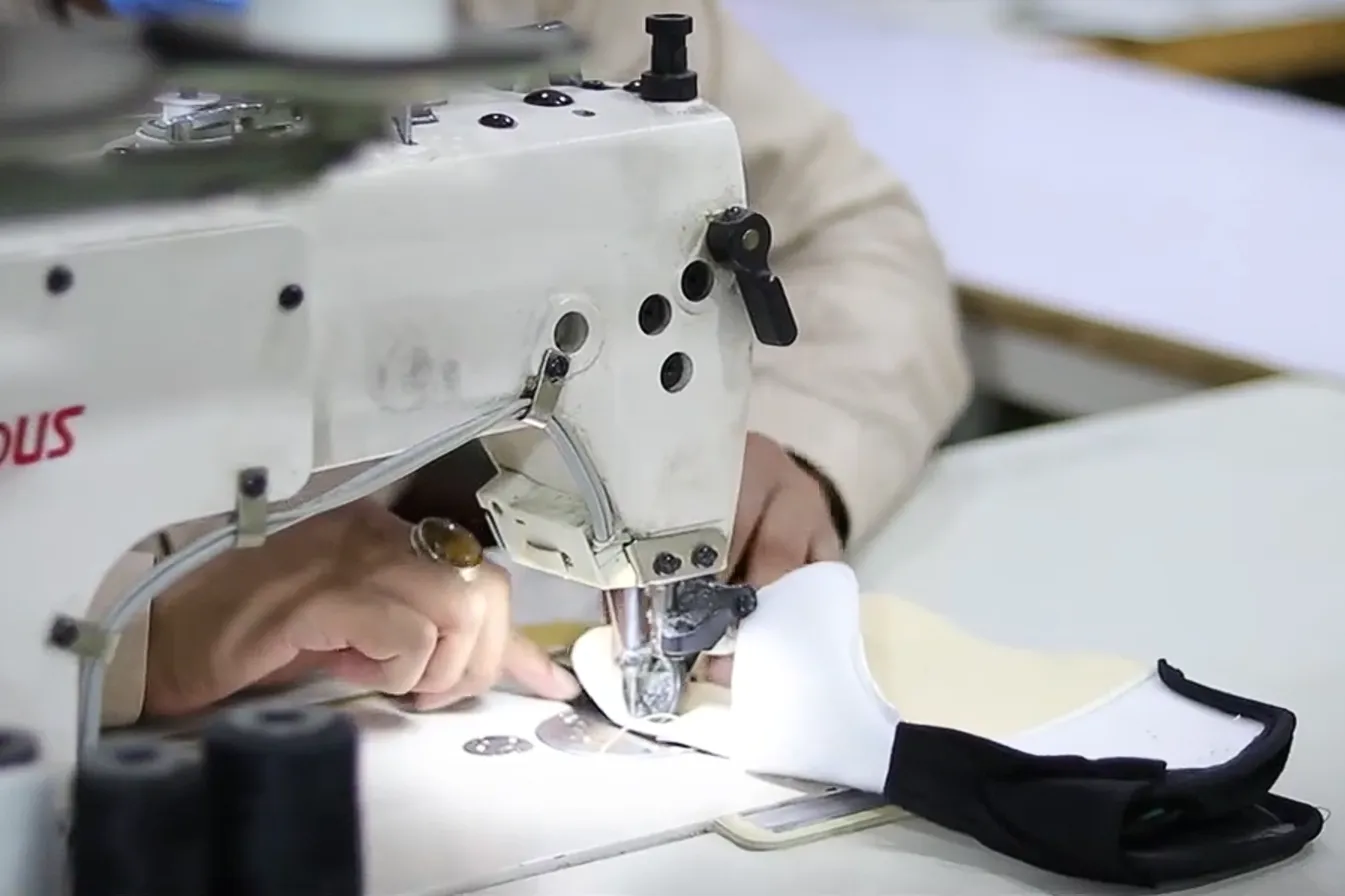 Eco-friendly goalkeeper gloves manufacturing at Spogen factory